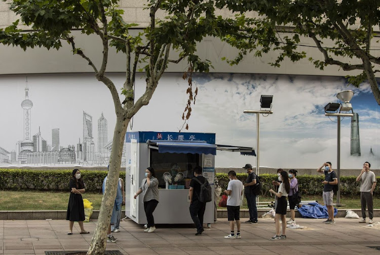 A Covid-19 testing booth is shown in downtown Shanghai, China. File photo: BLOOMBERG/QILAI SHEN