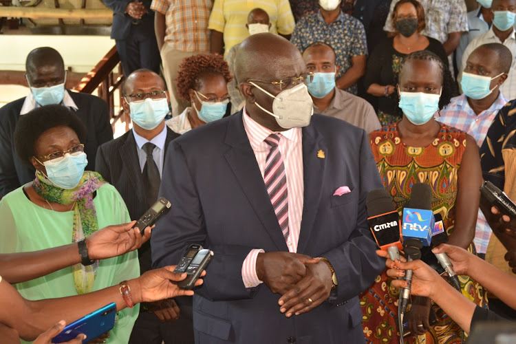 Education CS George Magoha briefs journalists at the Reef Hotel in Mombasa on Monday.