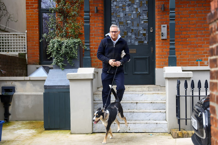 Football presenter Gary Lineker walks outside his home in London on March 13 2023.