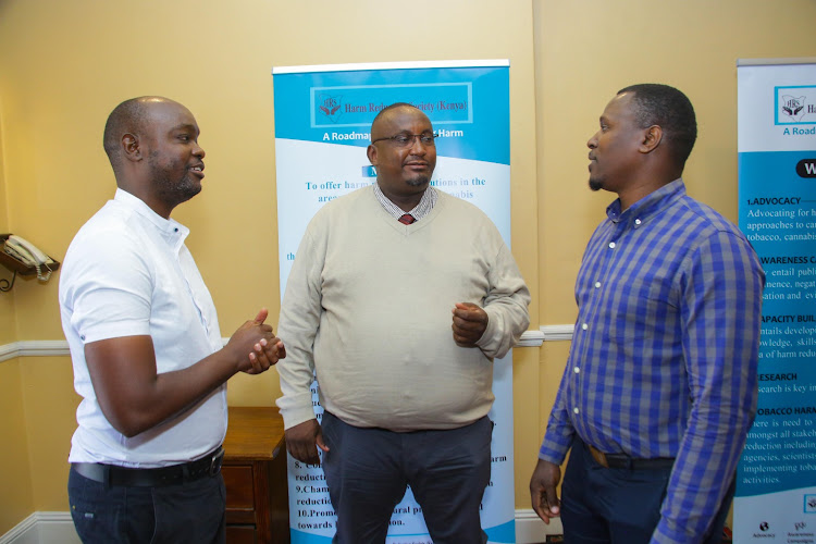 Harm Reduction Society of Kenya Vice Secretary-General, Dr. Nick Kioko (Left), Harm Reduction Society of Kenya Founder and Secretary-General, Dr. Michael Kariuki (center), and Campaign for Safer Alternatives spokesperson, Joel Sawa (Right) a press briefing in Nairobi on March 13, 2024.