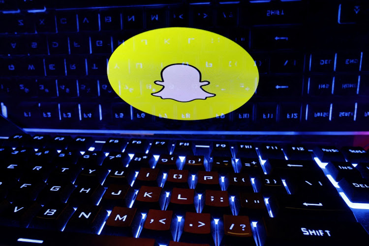 A keyboard is placed in front of a displayed Snapchat logo in this illustration taken on February 21 2023. File Picture: REUTERS/Dado Ruvic