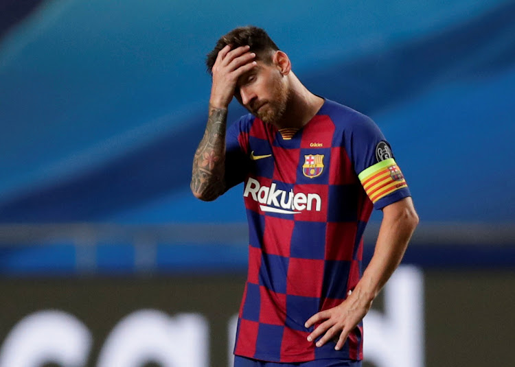 Barcelona's Lionel Messi looks dejected during Champions League quarter-final