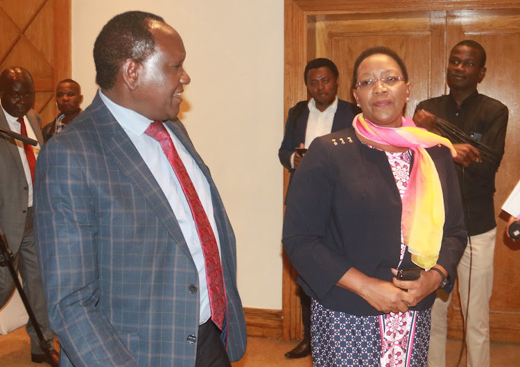 Health Director General John Masasabi and Health CS Sicily Kariuki during the National HPV Vaccine introduction stakeholders meeting held in Nairobi on Wedensday.