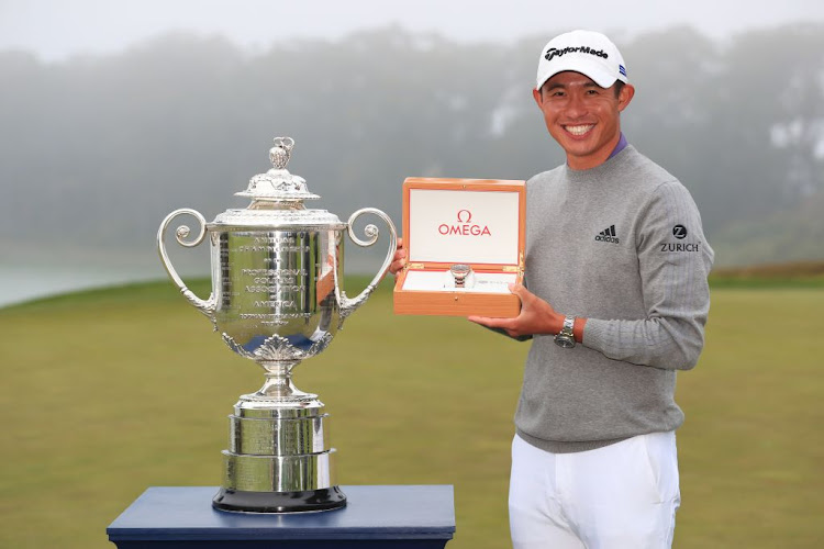 Collin Morikawa of the United States celebrates with the Wanamaker Trophy and the champion's watch after winning the 2020 PGA Championship at TPC Harding Park