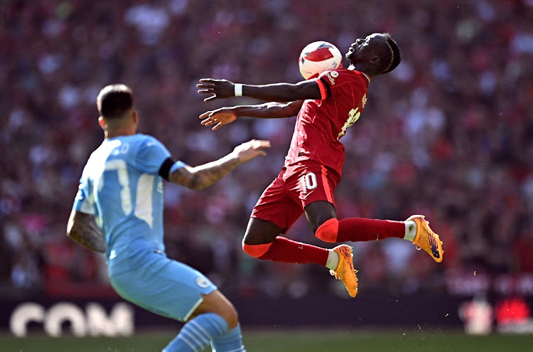 Liverpool's Sadio Mane chests the ball during the FA Cup semifinal against Manchester City at Wembley Stadium, London on April 16, 2022