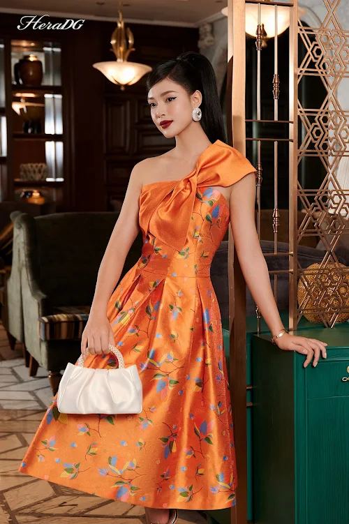 Đầm dạ hội nữ HeraDG thiết kế dáng xòe nơ ngực phối 1 màu, họa tiết hoa lan độc quyền, chất liệu tafta cao cấp WDPBB6068