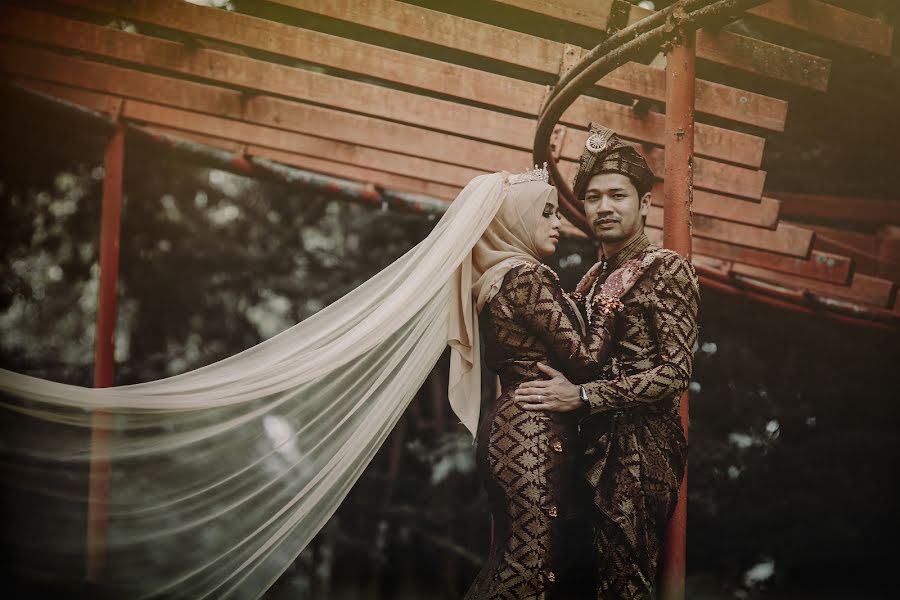 Fotógrafo de casamento Mohd Syazwan Md Rodzi (qasihlegion). Foto de 30 de maio 2022