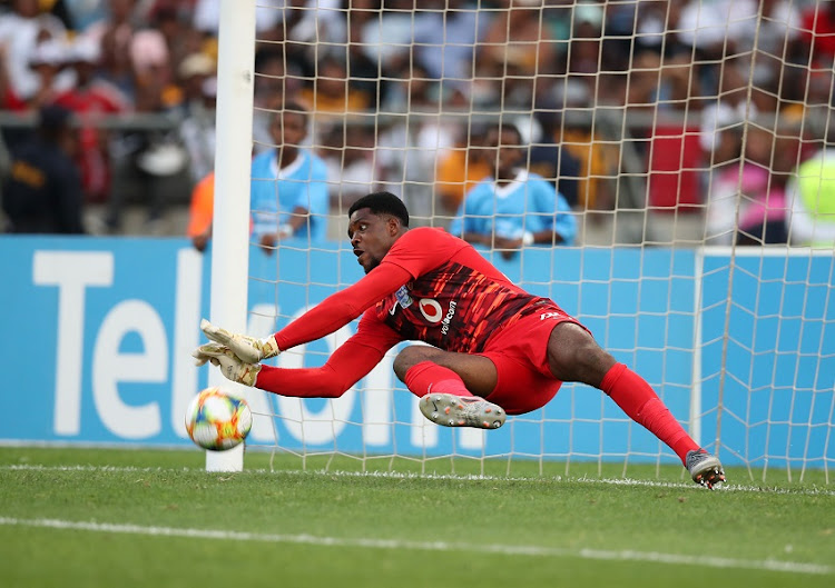 Daniel Akpeyi of Kaizer Chiefs saving a penalty during the 2019 Telkom Knockout quarterfinal match between Kaizer Chiefs and Orlando Pirates at Moses Mabhida Stadium, Pietermaritzburg, on 2 November 2019.