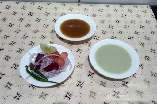 Salad, Raita And Chicken Gravy Trio