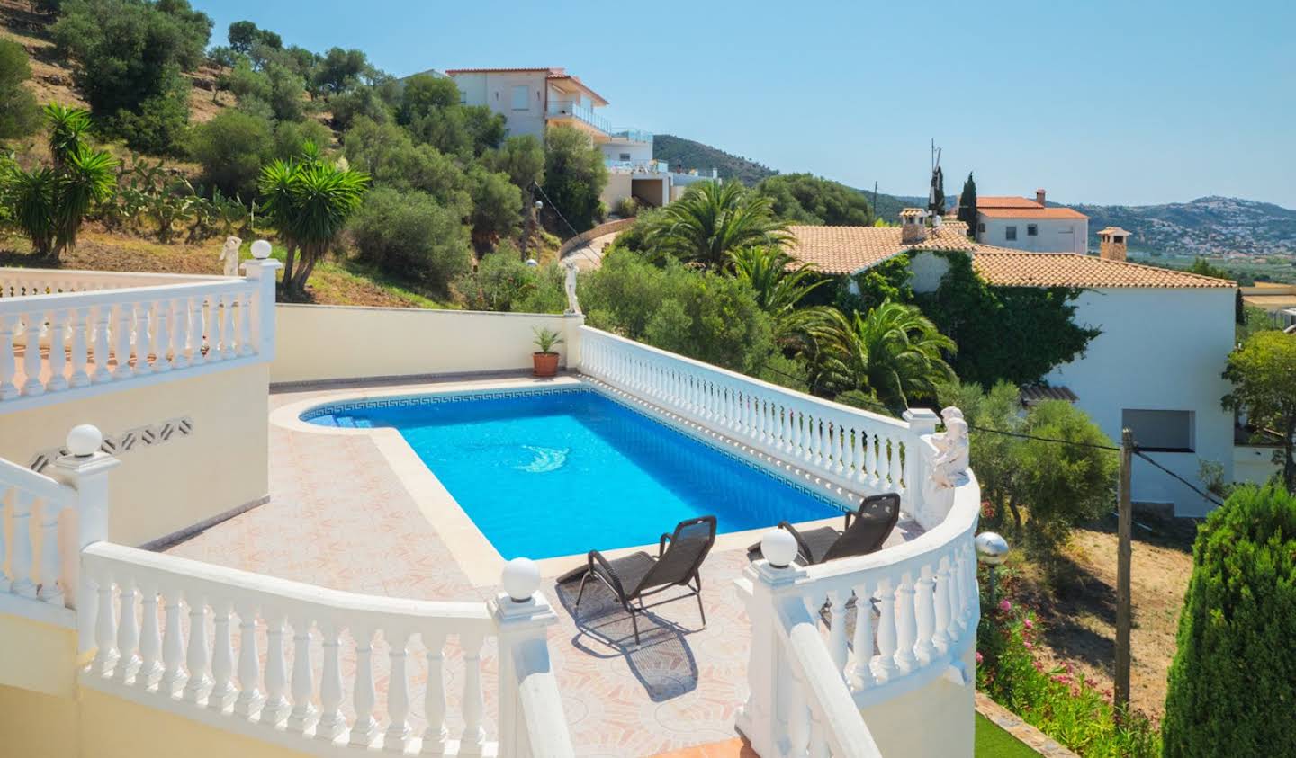 House with pool and garden Roses