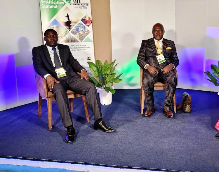 Migori governor aspirant Robert Okong’o with his running mate Michael Nyabuta during the Africities summit in Kisumu on Thursday.