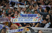 Real Madrid fans in the stands.