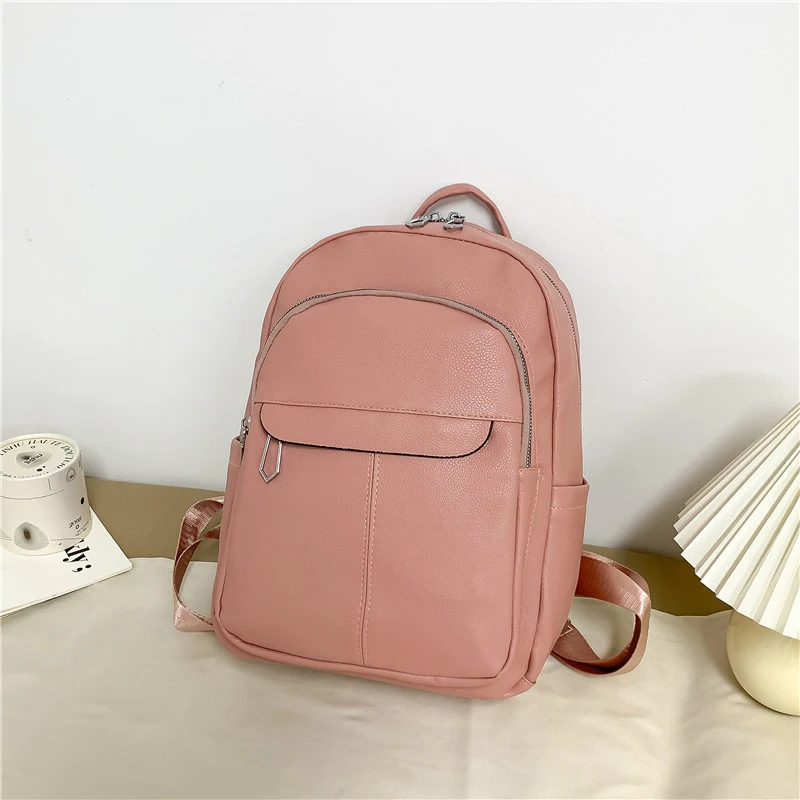 Sac à dos tendance pour femmes, idéal pour l'école ou l'université. Grand capacité, simple et polyvalent, parfait pour toutes vos affaires.