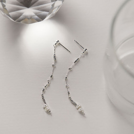 Title 1, Long tassel earrings featuring cold small piece...