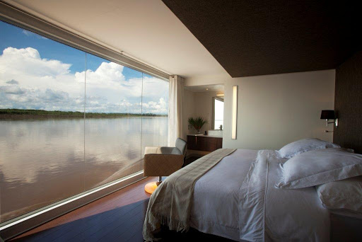 Aria-cabin - Aria's cabins feature deluxe beds with fine Peruvian linens and individual climate control.