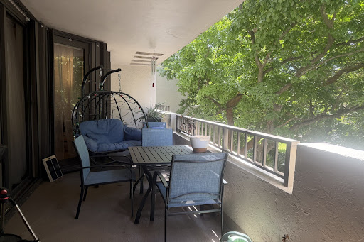 Balcony with outdoor seating and trees in this luxury apartment / penthouse for rent in Key Biscayne ($7,900)