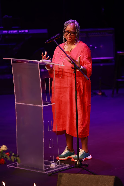 Brenda Sisane talks at the memorial service of Gloria Bosman