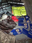 Uniforms belonging to traffic police and blue lights were seized.