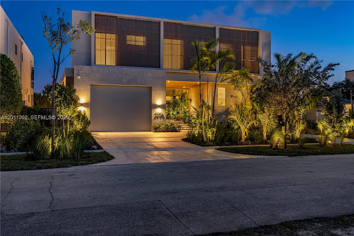 Modern villa with exterior lighting in this luxury house for sale in North Miami ($7,950,000 - 551 m²)