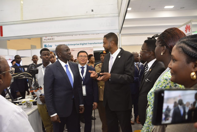 President William Ruto during the Huawei’s exhibition stand at Kenya Innovation Week on December 13.