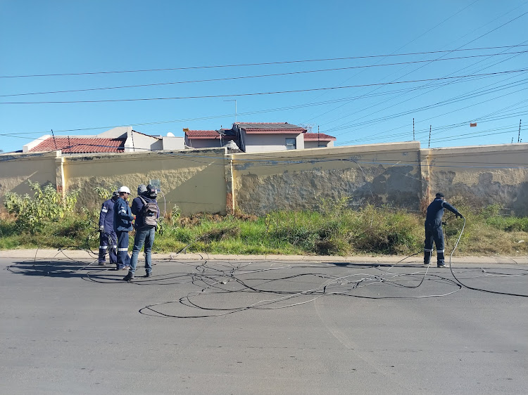 Eskom technicians cut illegal connections in Marlboro.