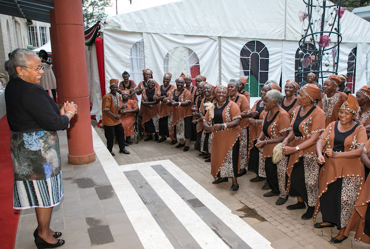 First Lady Margaret Kenyatta being entertained by women dancers at the National Museum on Friday