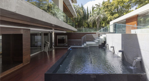 Wooden terrace modern pool lush garden in this luxury apartment / penthouse for sale in Montevideo ($1,900,000 - 287 m²)
