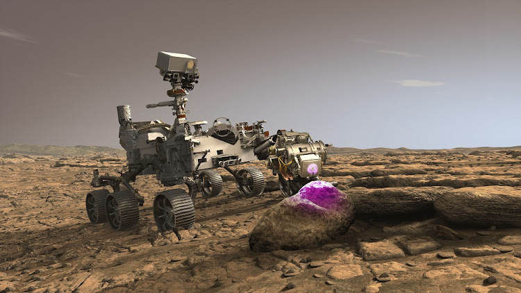 In this illustration, Nasa's Perseverance Mars rover uses the Planetary Instrument for X-ray Lithochemistry (PIXL). Located on the turret at the end of the rover's robotic arm, the X-ray spectrometer will help search for signs of ancient microbial life in rocks.