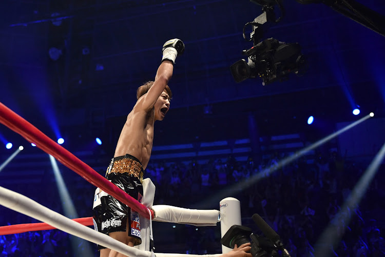 Japan's Naoya Inoue celebrates his win over Britain's Jamie McDonnell during their WBA world bantamweight title boxing bout in Tokyo