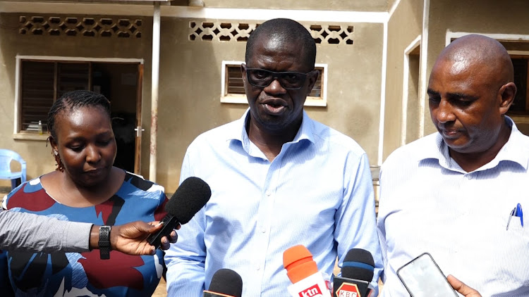 Government Chief Pathologist Johansen Oduor with Director Homicide Unit in the DCI Martin Nyuguto during press briefing after completing the second phase of autopsies of bodies recovered from Shakahola forest at Malindi Sub County hospital mortuary.