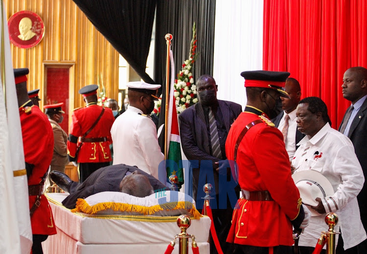 COTU Secretary General Francis Atwoli viewing the body of the late President Mwai Kibaki lying in state at the Parliament Building on April 25, 2022