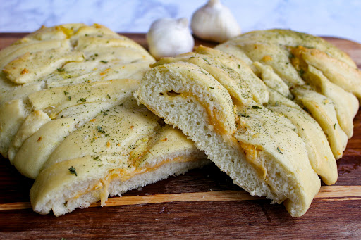 3 cheese garlic braid cut in half.