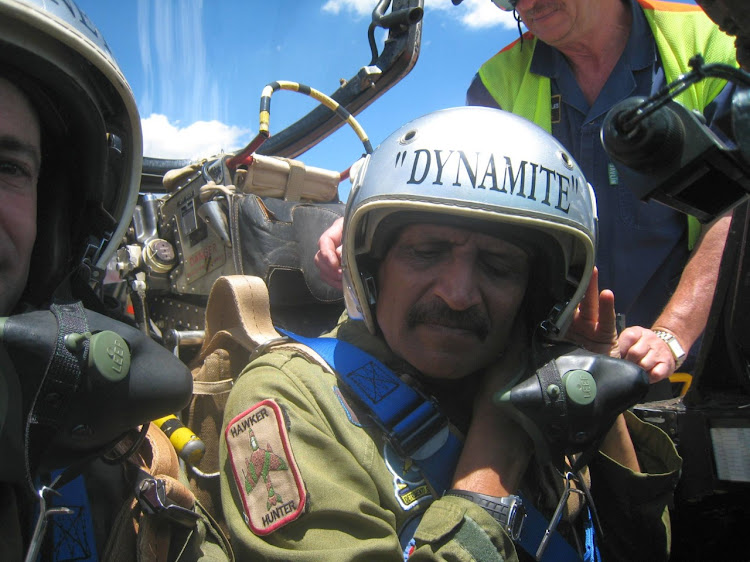 Col Rama 'Dynamite' Iyer straps in to his beloved Vampire jet fighter before a training flight.