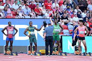 Akani Simbine reacts to being disqualified for a false start in the men's 100m semifinal in Budapest on Sunday.