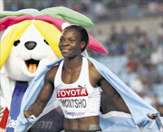 NEW STAR IS BORN: Botswana's Amantle Montsho celebrates after winning the women's 400m final at the IAAF World Championships in Daegu on Monday. Photo: REUTERS