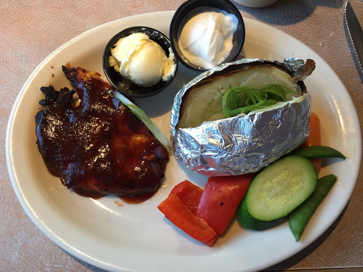 Baby Ray's BBQ Chicken, Baked Potato and Sautéed Vegetables.