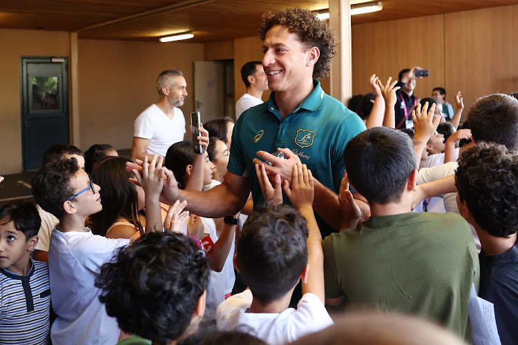 Mark Nawaqanitawase of the Wallabies arrives during a school visit during the Rugby World Cup, at Ecole Elementaire Molina in Saint-Etienne, France on Monday.