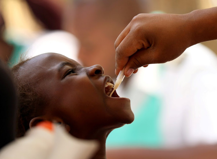 A child receives a cholera vaccination at a clinic in Harare, Zimbabwe. Picture: REUTERS/PHILIMON BULAWAYO