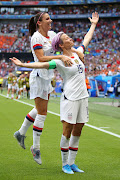 A file photo of Megan Rapinoe of the USA celebrating with Alex Morgan during the FIFA Women's World Cup in  France in July 2019. 