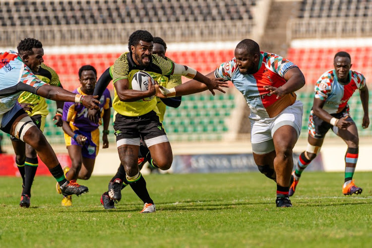 Jone Kubu of Kabras evading Quins defence during the Charity Cup earlier this season