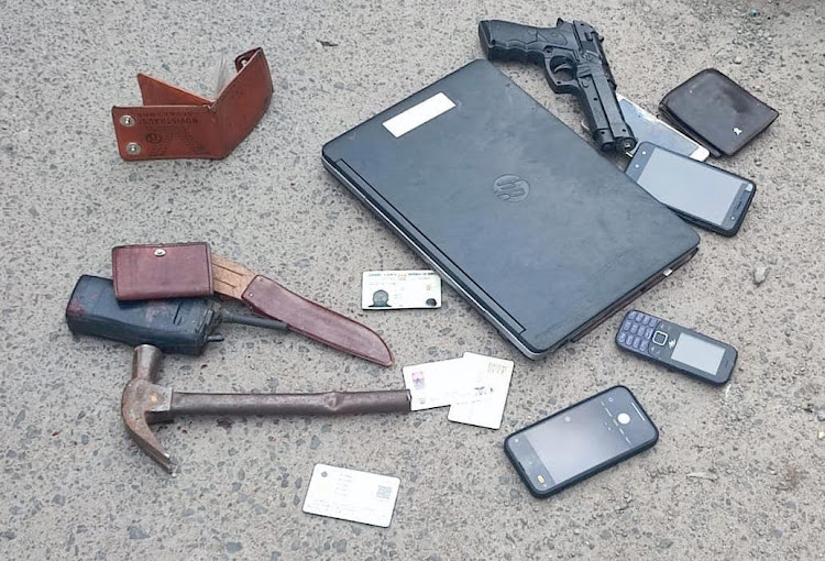 Some of the items recovered from slain suspects along Mombasa Road, Nairobi in a botched robbery on July 19, 2022- NPS