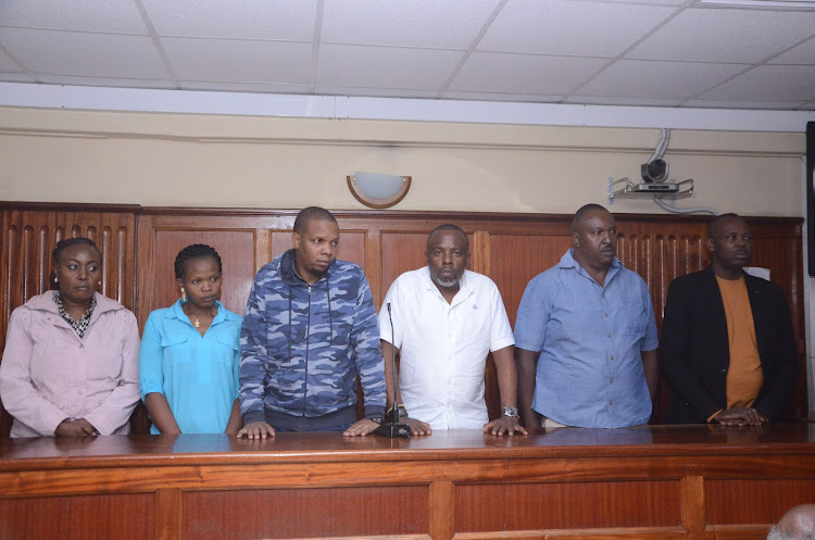 Ruth Watahi Irungu, Esther Ndinda Mulinge, Samuel Kuria Ngugi, Andrew Karanja Wainana, Christopher Lumbazio Andika and Paul Wainaina at Milimani Law Courts on February 14, 2023