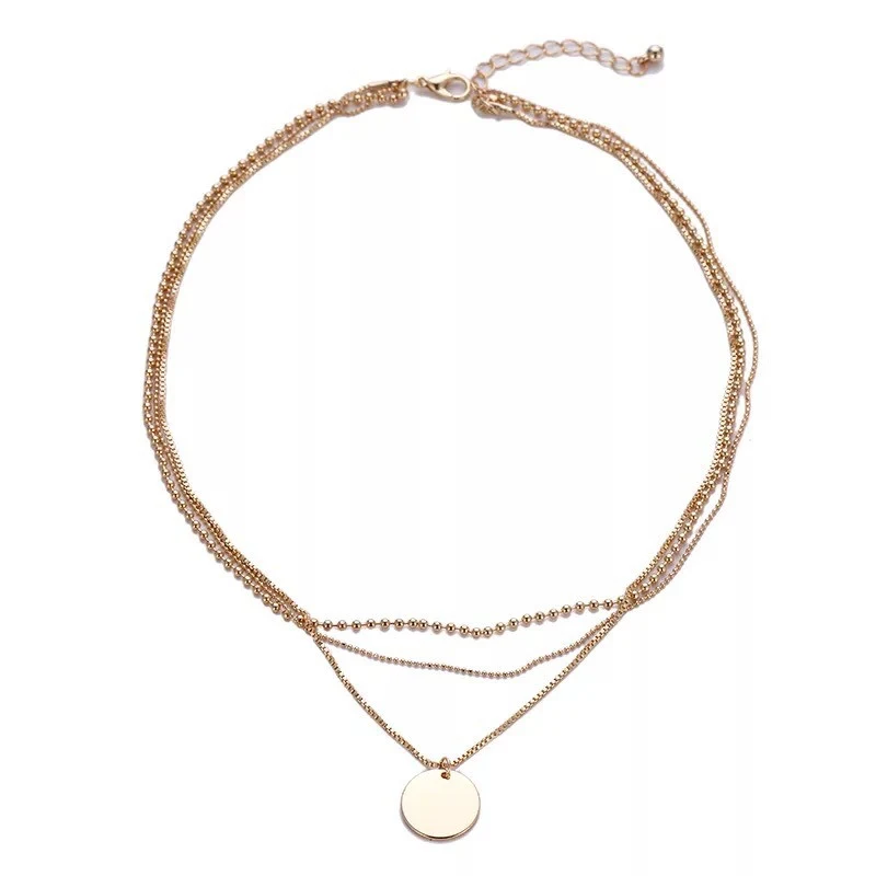 Multi-coin three-ply necklace. Elevate your style with this unique and versatile piece. Perfect for any occasion. A time