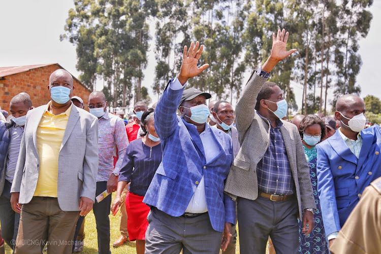 Interior CS Fred Matiang'i and his Agriculture counterpart Peter Munya in Nyamira County on Sunday