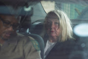 June Steenkamp, mother of Reeva Steenkamp who was murdered by former athlete Oscar Pistorius in 2013, arrives at Atteridgeville Correctional Centre to attend his parole hearing in Pretoria on March 31 2023. 