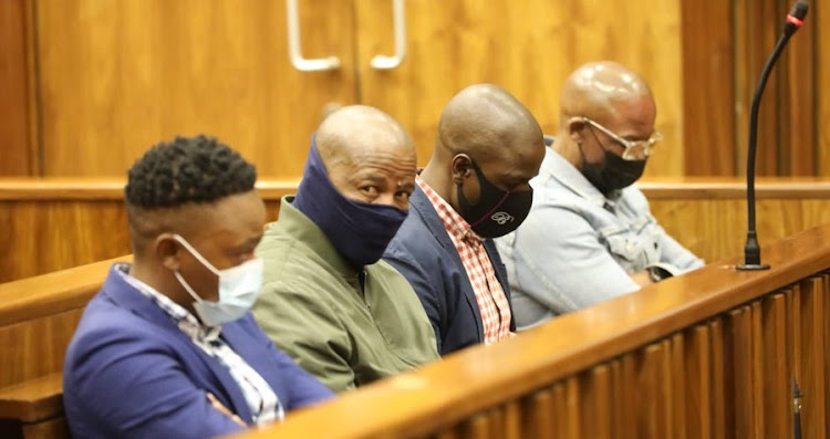 The four police officers accused of the murder of Mthokozisi Ntumba at the Johannesburg high court while the judgement was read out.