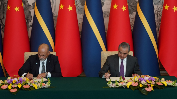 Chinese foreign minister Wang Yi, right and minister of foreign affairs and trade of Nauru Lionel Aingimea sign the Joint Communique on the Resumption of Diplomatic Relations between China and Nauru, at Diaoyutai State Guesthouse, in Beijing, China on January 24 2024. Picture: ANDREA VERDELLI/POOL via REUTERS