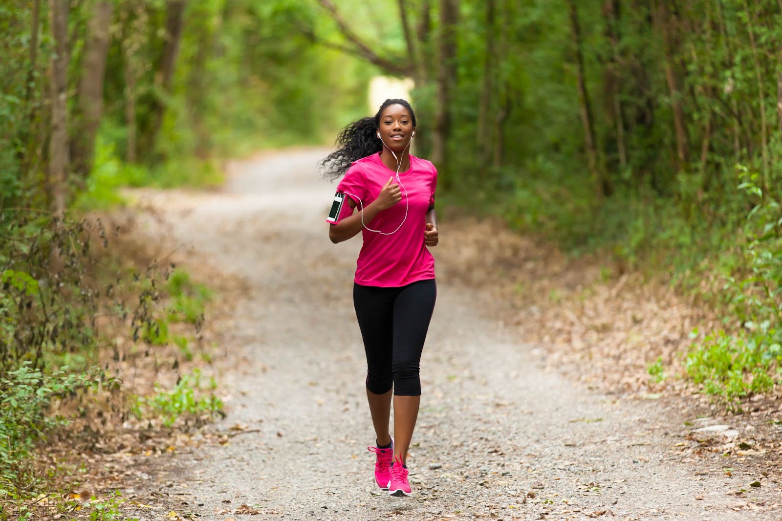 A woman running outdoors.