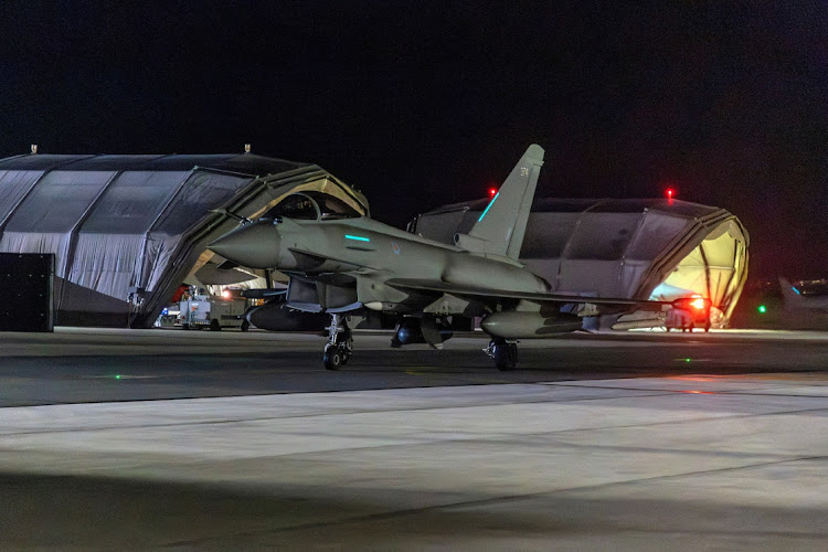 RAF Typhoon aircraft returns to RAF Akrotiri after striking military targets in Yemen during the US-led coalition operation, aimed at the Iran-backed Houthi militia that has been targeting international shipping in the Red Sea, in Cyprus, in this handout picture released on January 12, 2024.