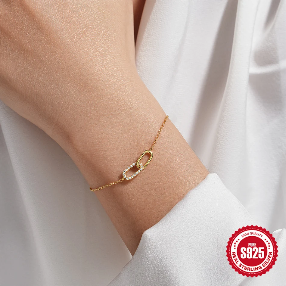 Bracelet femme en argent sterling S925 avec croix et double boucle en zircon, un bijou élégant et durable.